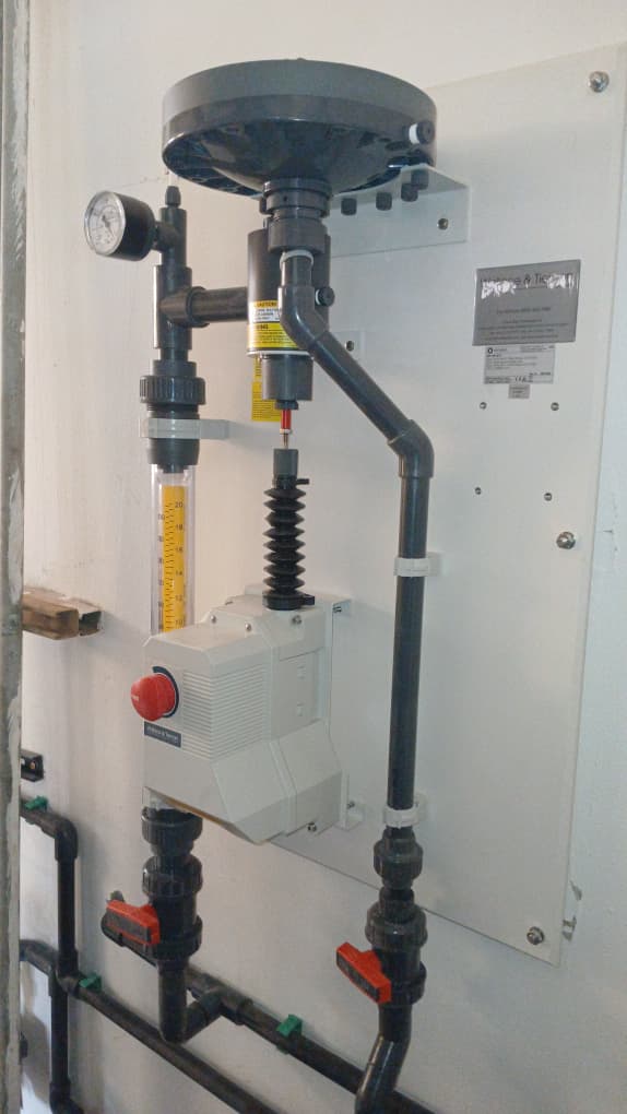 Front view of installed emergency safety rinse station with shower head and flow tube